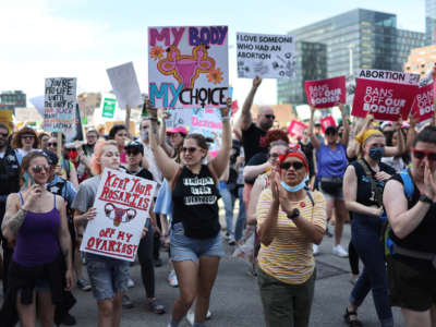 Abortion rights demonstrators march into downtown following a rally in Union Park on May 14, 2022, in Chicago, Illinois.